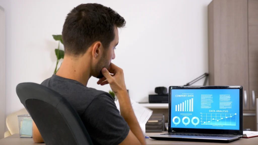 business man with beard working hard his desk office motivated young man 1 alanced